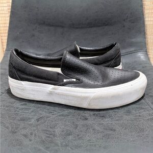 Vans Women's Black and White Slip-On Sneakers